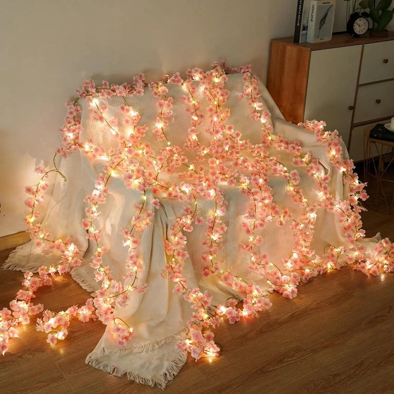 Single pink artificial cherry blossom flower vine