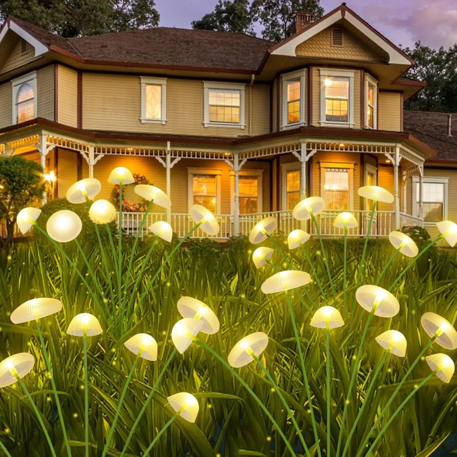 Colorful solar mushroom lights glowing in an outdoor garden